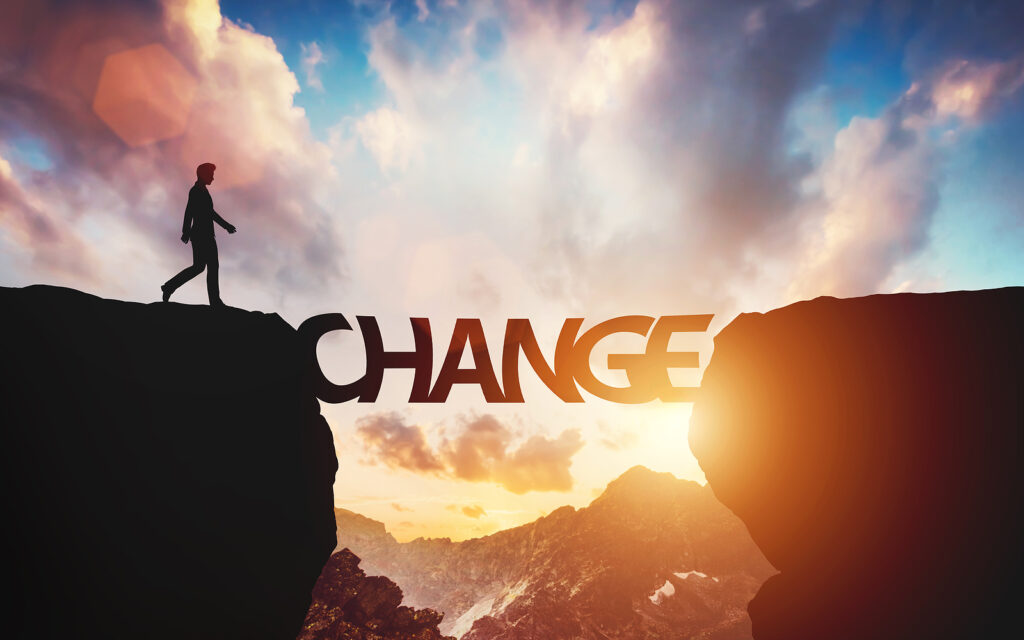 A silhouette of a person walking towards a cliff bridge with the word “change” as a bridge. This could represent the fears of life transitions an anxiety therapist in Richmond, VA can address. Learn more about therapy for life transitions in Virginia and other services like equine therapy in Virginia. 