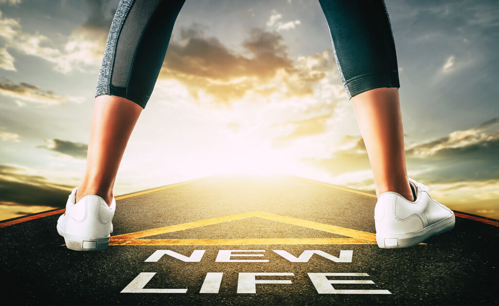 A close up of a person standing over an arrow with the words "new life". Learn more about the help that therapy for life transitions in Virginia can offer by searching for a life transitions therapist in Fredericksburg, VA. They can offer support with online therapy in Virginia and other services today. 