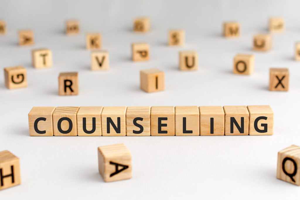 A close up of wooden letters that spell counseling. Learn more about the help a therapist for men in Powhatan, VA can offer by searching for men's mental health therapy in Richmond, VA today. Learn more about therapy for men in Lynchburg, VA and beyond. 