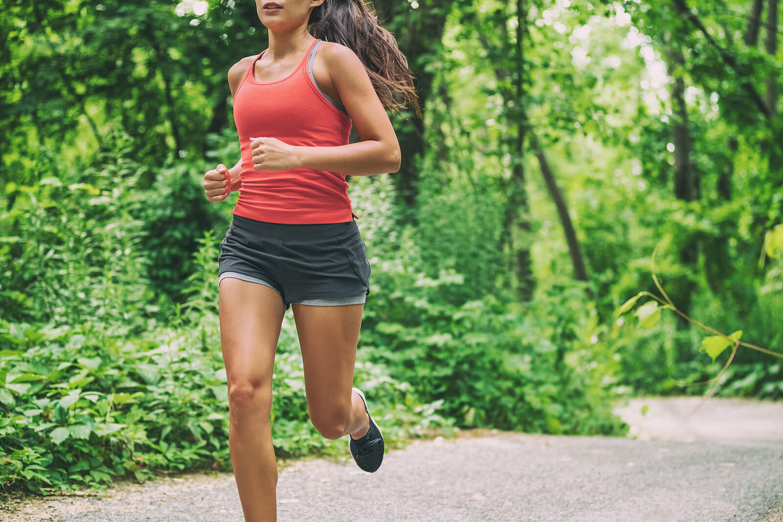 A close up of a woman running on a forest path. This could represent how athletes can be affected by self-talk. Learn how an equine therapist in Virginia can offer support with improving self-talk. Search for online therapy in Powhatan, VA and how anxiety therapy in Powhatan, VA can help today.