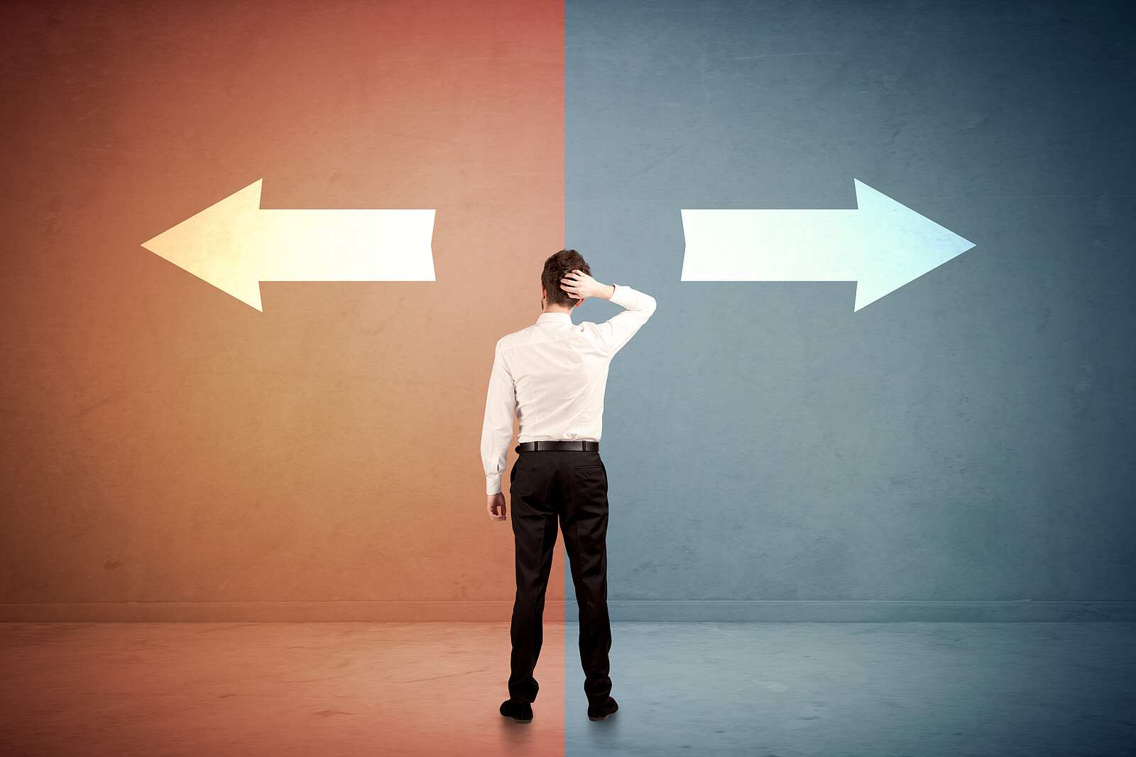 A man stands between two large arrows pointing in opposite directions, hand on his head as he considers which path to take. This image captures the central question of the blog — whether standard weekly EMDR or a more concentrated format is the right fit — a decision that an EMDR therapist in Powhatan, VA can help you navigate through an honest assessment of your history, readiness, and goals. For those considering EMDR intensives in Virginia, understanding the differences between these two formats is the first and most important step.